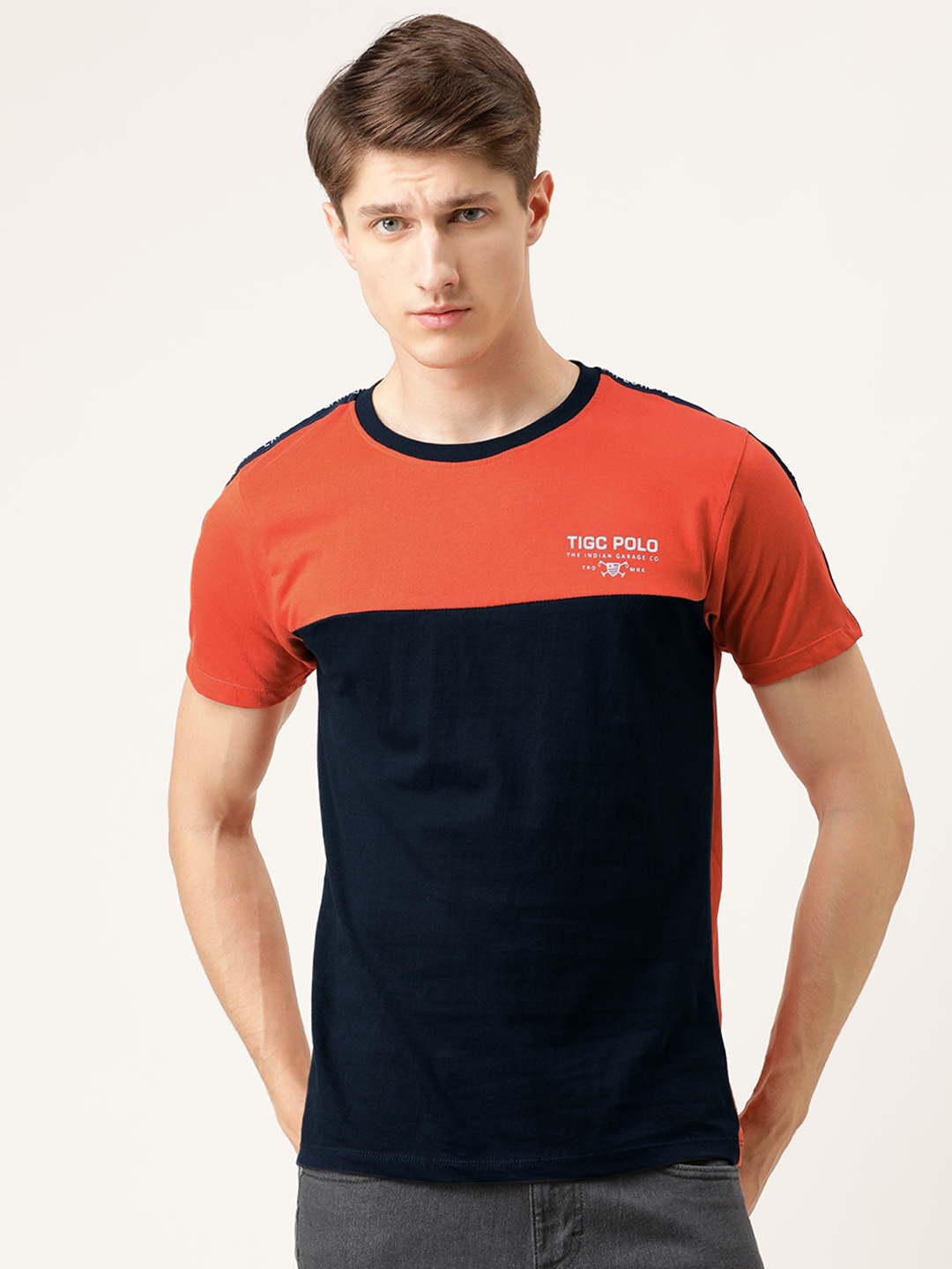 The Indian Garage Co Men Navy Blue Orange Colourblocked Round Neck Pure Cotton T-shirt
The Indian Garage Co Men Navy Blue Orange Colourblocked Round Neck Pure Cotton T-shirt