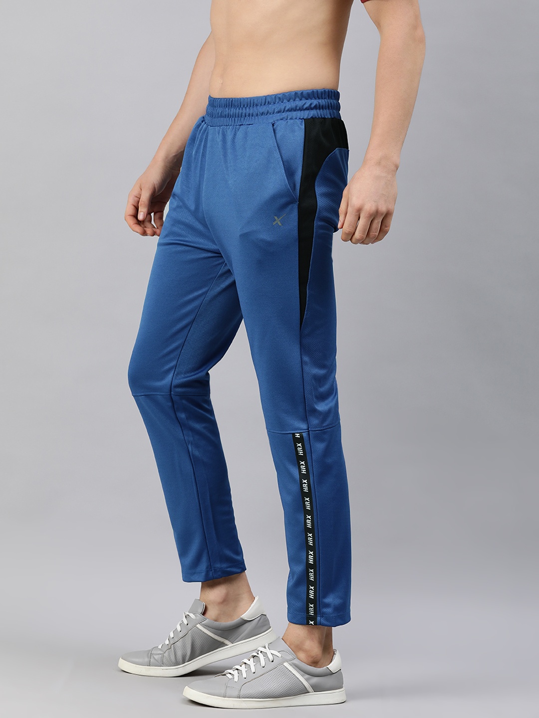HRX By Hrithik Roshan Men Blue & Black Slim Rapid-Dry Antimicrobial Training Track Pants
HRX By Hrithik Roshan Men Blue & Black Slim Rapid-Dry Antimicrobial Training Track Pants
