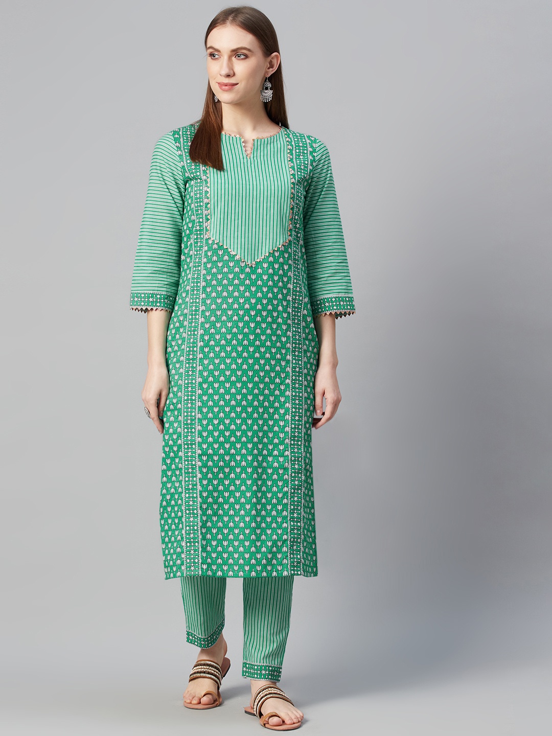 ZIYAA Women Green & White Ethnic Motifs Screen Print Pure Cotton Kurta with Trousers
ZIYAA Women Green & White Ethnic Motifs Screen Print Pure Cotton Kurta with Trousers