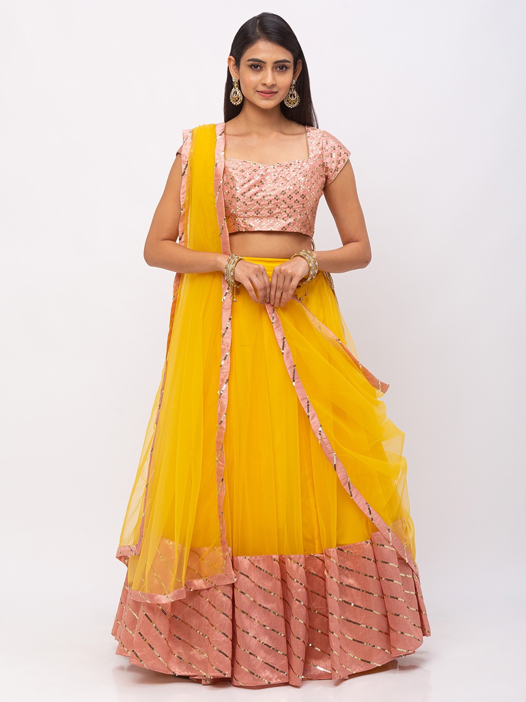 6Y COLLECTIVE Women Yellow & Peach-Coloured Sequin Embroidered Leheriya Patterned Hem Ready to Wear Net Lehenga & Unstitched Choli with Dupatta
6Y COLLECTIVE Women Yellow & Peach-Coloured Sequin Embroidered Leheriya Patterned Hem Ready to Wear Net Lehenga & Unstitched Choli with Dupatta