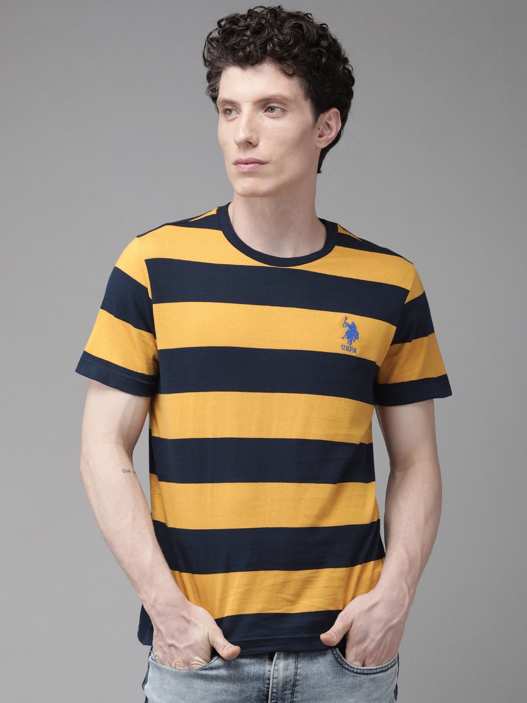U.S. POLO ASSN. Men Navy Blue & Orange Striped Brand Logo Embroidered Pure Cotton T-shirt
U.S. POLO ASSN. Men Navy Blue & Orange Striped Brand Logo Embroidered Pure Cotton T-shirt