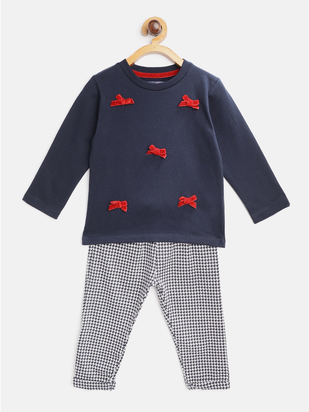 Nauti Nati Girls Navy Blue & White Bow Pure Cotton T-shirt with Houndstooth Print Trousers
Nauti Nati Girls Navy Blue & White Bow Pure Cotton T-shirt with Houndstooth Print Trousers