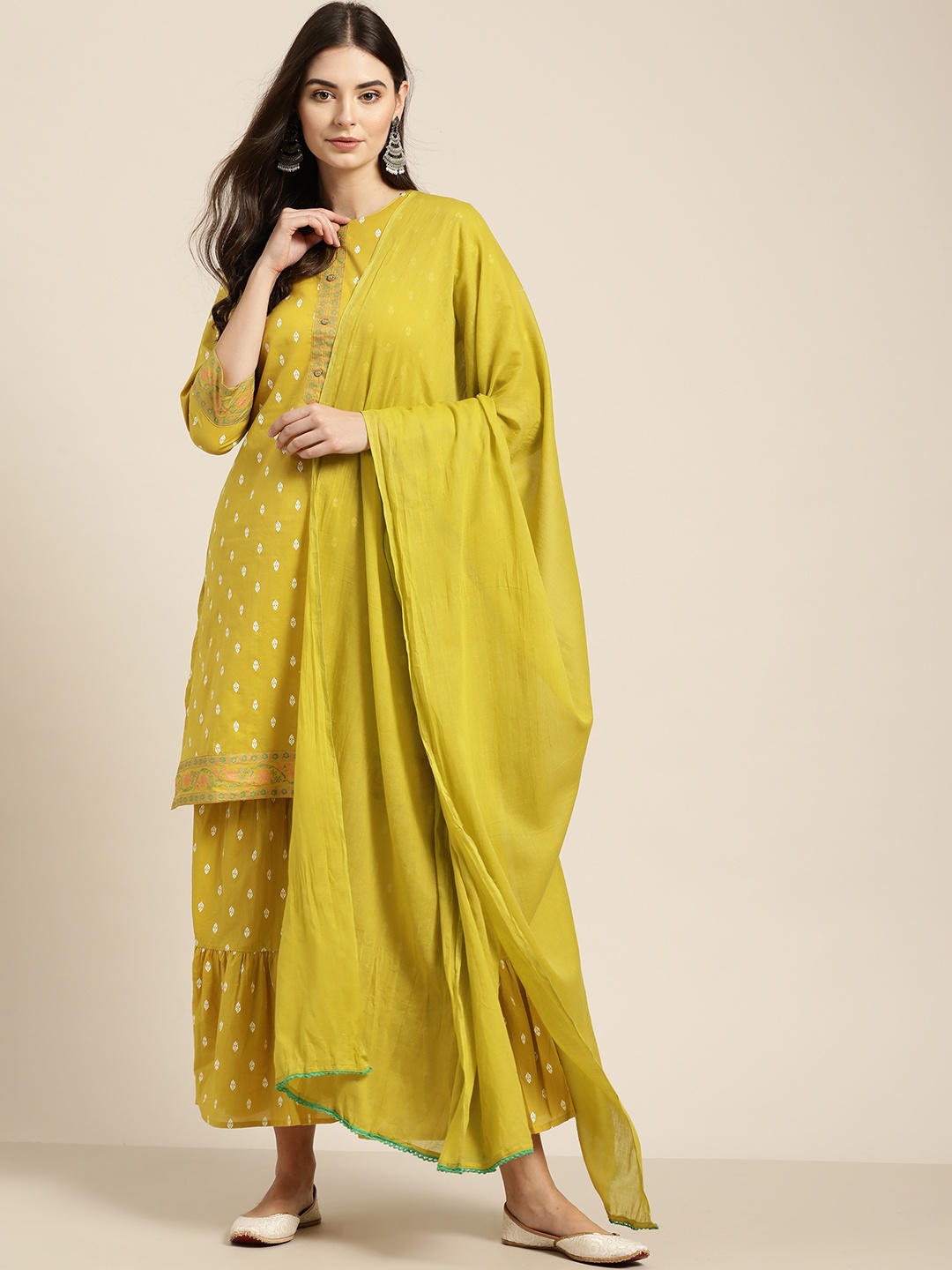 Sangria Women Mustard Yellow & White Pure Cotton Printed Kurta with Sharara & Dupatta
Sangria Women Mustard Yellow & White Pure Cotton Printed Kurta with Sharara & Dupatta