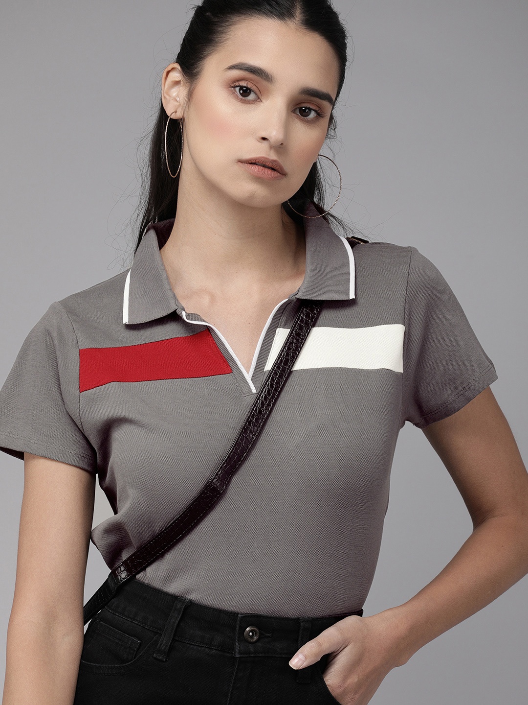 The Roadster Lifestyle Co Women Grey Melange Solid Polo Collar T-shirt With Colorblocked Detailing
The Roadster Lifestyle Co Women Grey Melange Solid Polo Collar T-shirt With Colorblocked Detailing