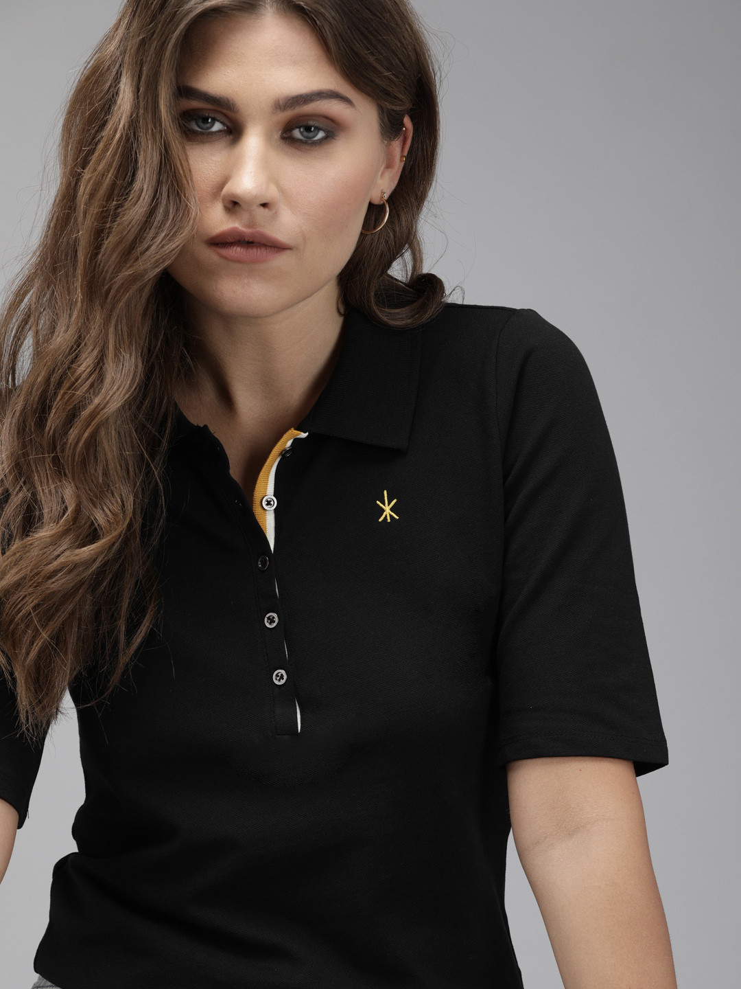 The Roadster Lifestyle Co Women Black Solid Polo Collar T-shirt
The Roadster Lifestyle Co Women Black Solid Polo Collar T-shirt