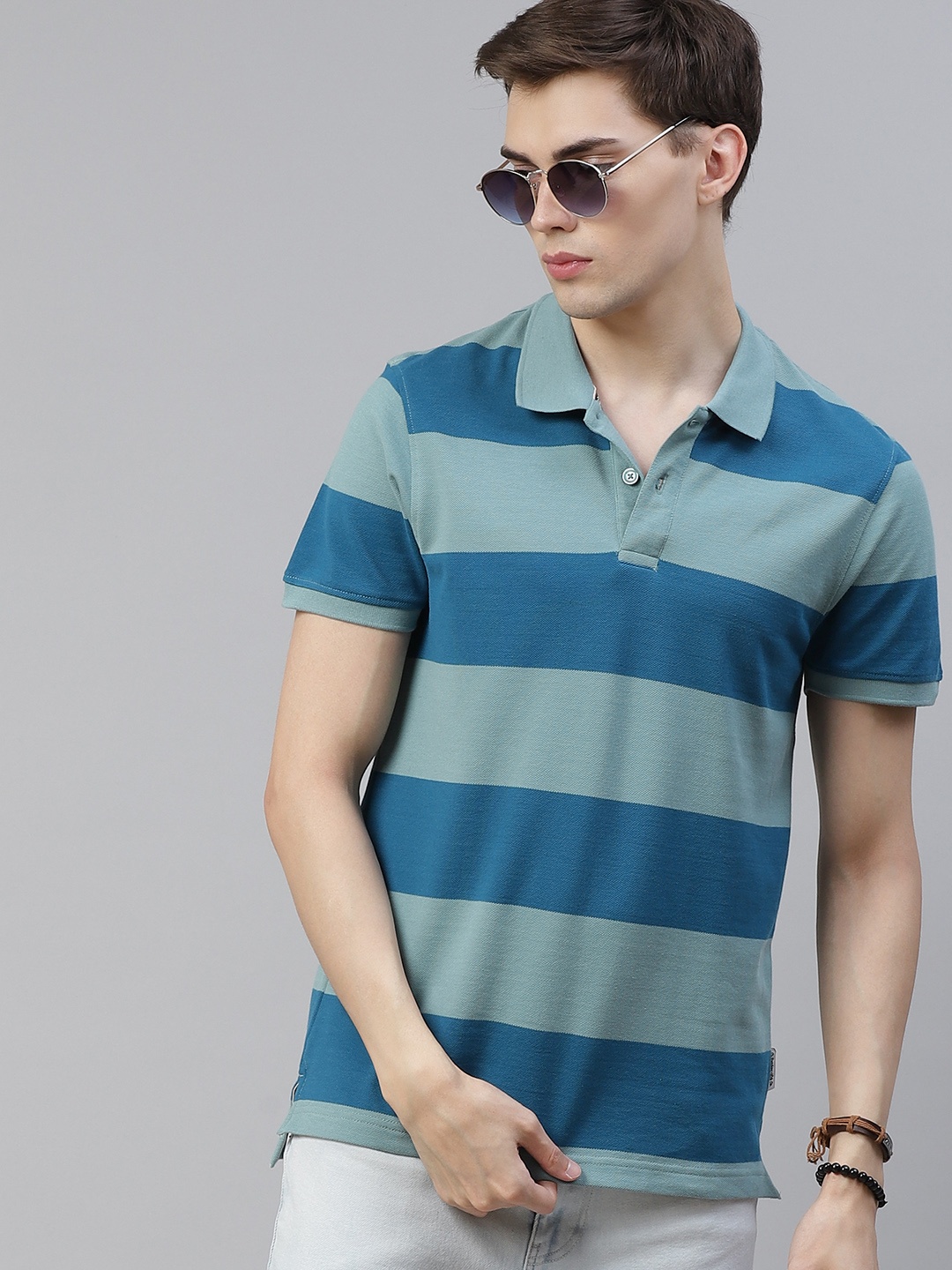 The Roadster Lifestyle Co Men Blue & Sea Green Pure Cotton Striped Polo Collar T-shirt
The Roadster Lifestyle Co Men Blue & Sea Green Pure Cotton Striped Polo Collar T-shirt