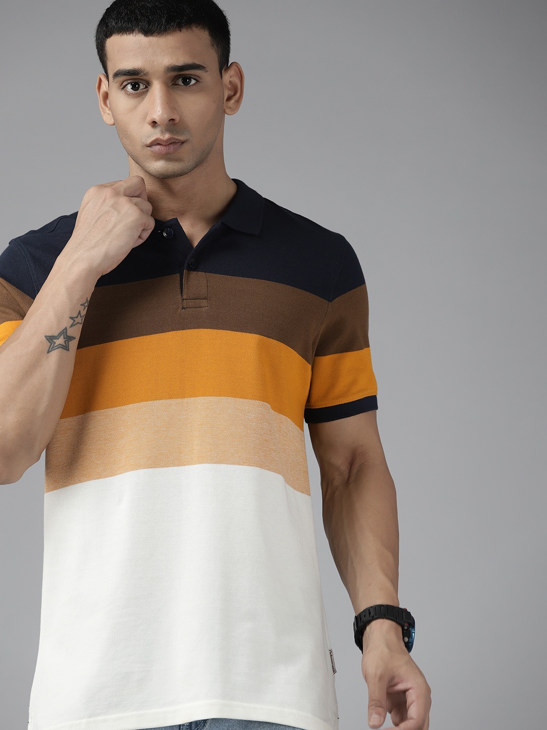 Roadster Men Navy Blue & Mustard Yellow Colourblocked Polo Collar Pure Cotton T-shirt
Roadster Men Navy Blue & Mustard Yellow Colourblocked Polo Collar Pure Cotton T-shirt