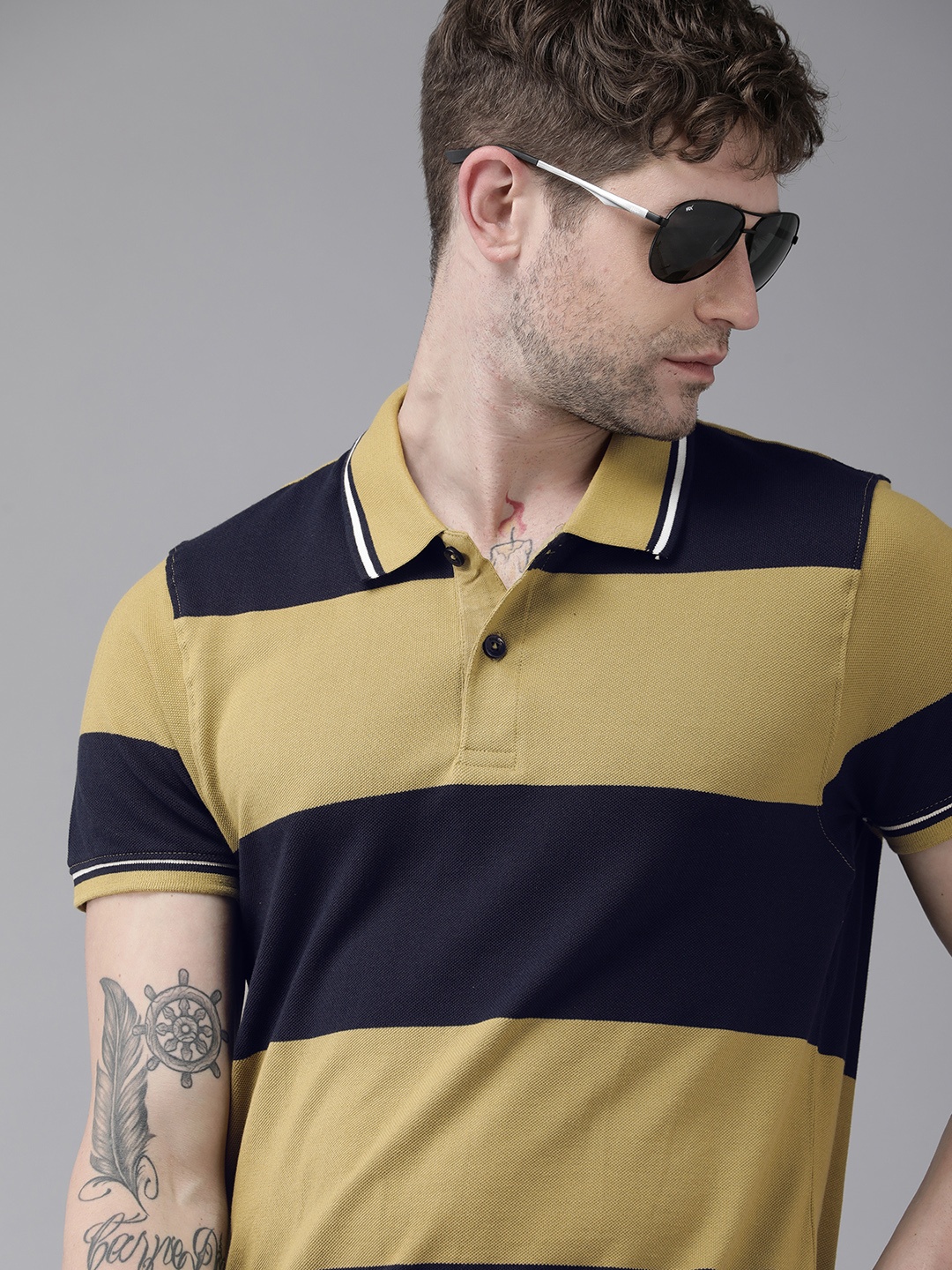 The Roadster Lifestyle Co Men Khaki Navy Blue Striped Polo Collar Pure Cotton T-shirt
The Roadster Lifestyle Co Men Khaki Navy Blue Striped Polo Collar Pure Cotton T-shirt