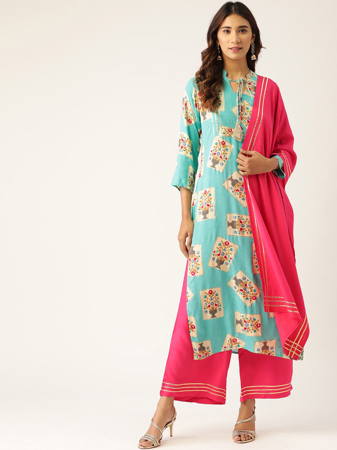 Kurti's by Menka Women Turquoise Blue & Fuchsia Printed Kurta with Palazzos & Dupatta
Kurti's by Menka Women Turquoise Blue & Fuchsia Printed Kurta with Palazzos & Dupatta