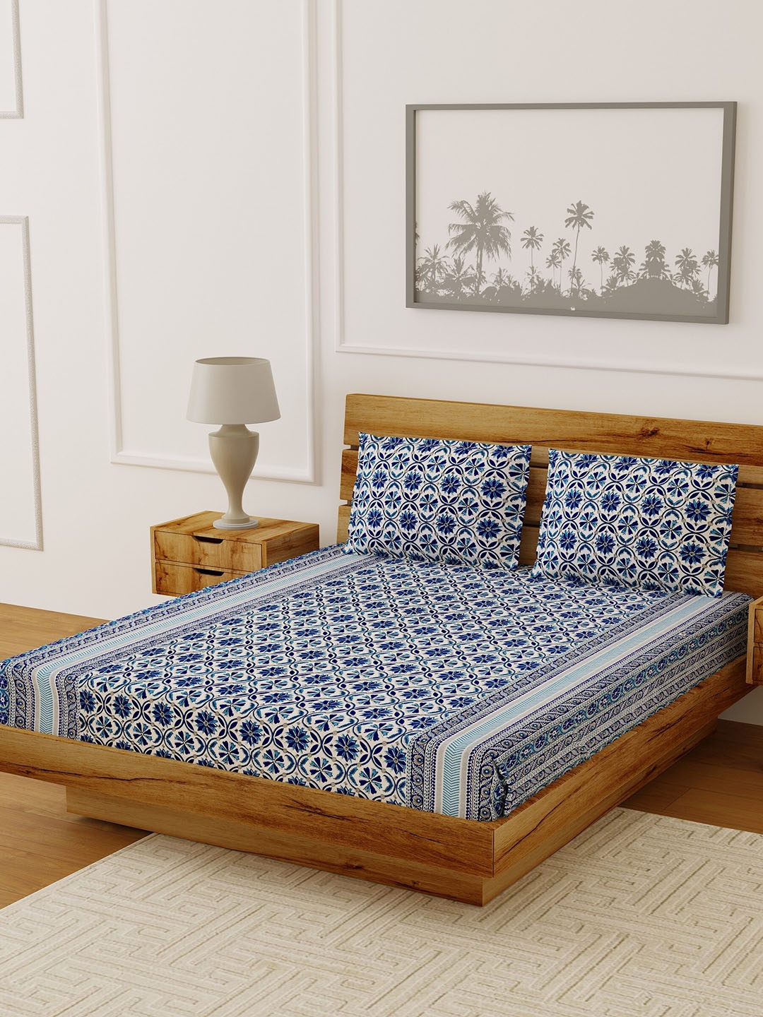 LIVING ROOTS Off-White & Blue Printed 144 TC Double King Bedsheet With 2 Pillow Covers
LIVING ROOTS Off-White & Blue Printed 144 TC Double King Bedsheet With 2 Pillow Covers