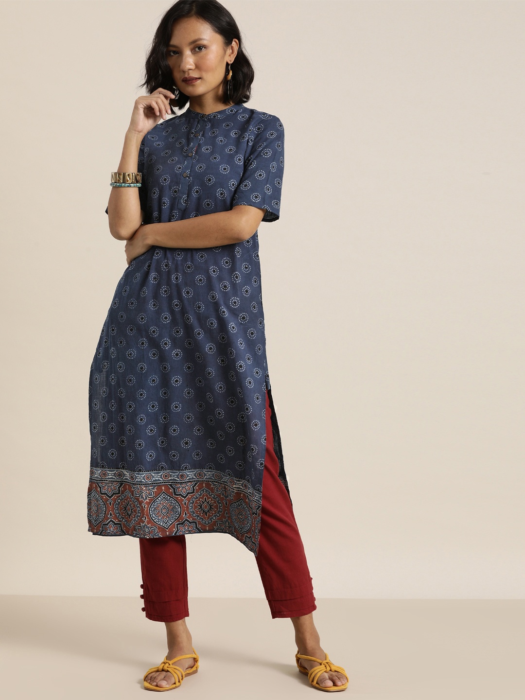 Taavi Women Navy Blue & Off White Ajrakh Hand Block Print Sustainable Straight Kurta
Taavi Women Navy Blue & Off White Ajrakh Hand Block Print Sustainable Straight Kurta