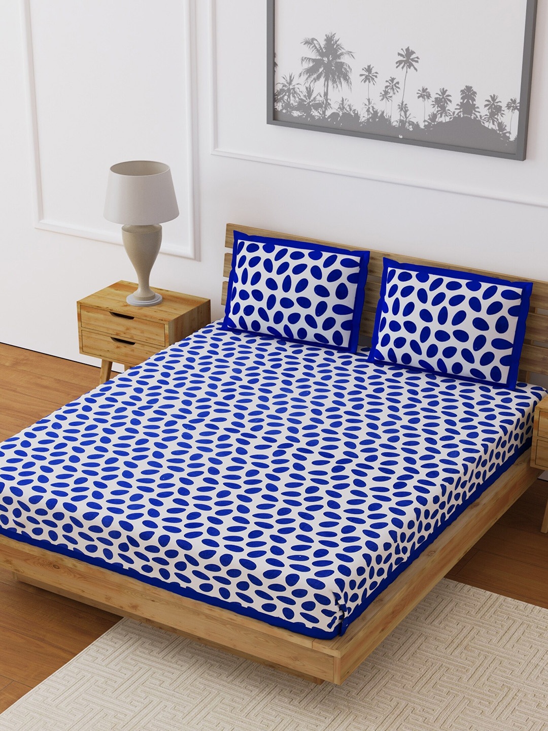 LIVING ROOTS Blue & White Abstract 210 TC Cotton 1 Queen Bedsheet with 2 Pillow Covers
LIVING ROOTS Blue & White Abstract 210 TC Cotton 1 Queen Bedsheet with 2 Pillow Covers