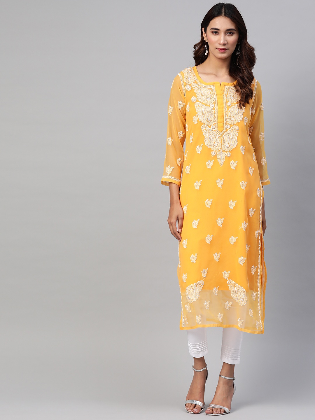 ADA Women Mustard & White Chikankari Embroidered Sustainable Kurta with Trousers & Inner
ADA Women Mustard & White Chikankari Embroidered Sustainable Kurta with Trousers & Inner