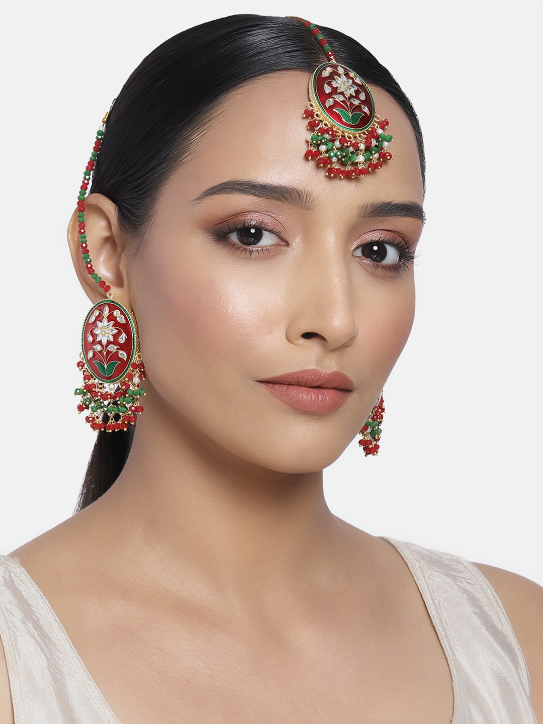 Peora Maroon & Green Floral Inscribed Handcrafted Maang Tikka & Earrings with Ear Chain
Peora Maroon & Green Floral Inscribed Handcrafted Maang Tikka & Earrings with Ear Chain