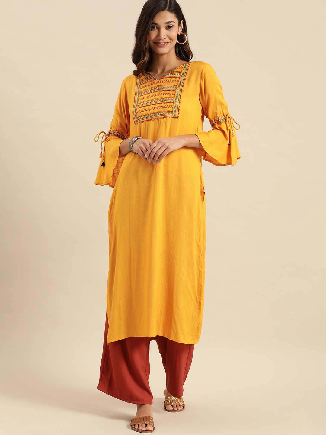 Varanga Women Mustard Yellow Tribal Yoke Design Bell Sleeves Thread Work Pure Cotton Kurta
Varanga Women Mustard Yellow Tribal Yoke Design Bell Sleeves Thread Work Pure Cotton Kurta