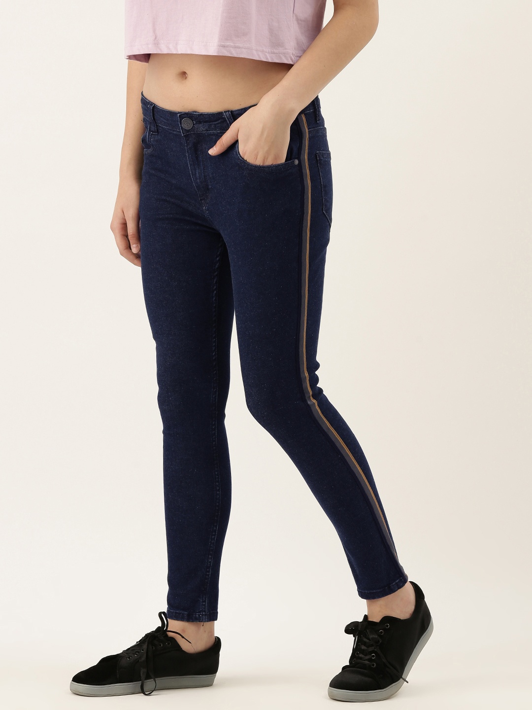 Campus Sutra Women Navy Blue Cotton Slim Fit Mid-Rise Clean Look Jeans with Side Stripe
Campus Sutra Women Navy Blue Cotton Slim Fit Mid-Rise Clean Look Jeans with Side Stripe
