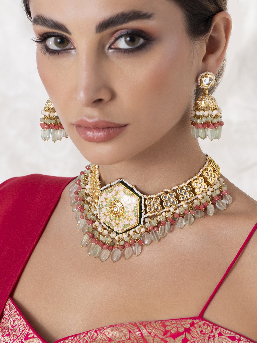 Rubans 24K Gold-Plated Green & Peach-Colour Kundan-Studded Beaded Enamelled Handcrafted Jewellery Set
Rubans 24K Gold-Plated Green & Peach-Colour Kundan-Studded Beaded Enamelled Handcrafted Jewellery Set