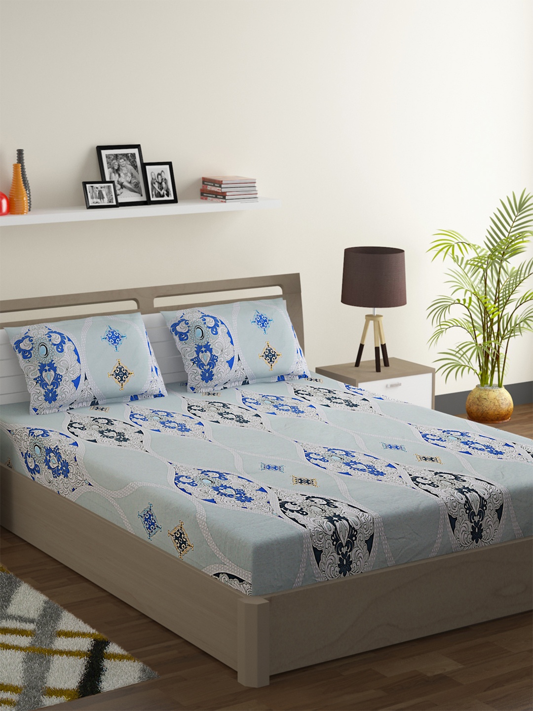 SWAYAM Blue & White Ethnic Motifs 144 TC Cotton 1 King Bedsheet with 2 Pillow Covers
SWAYAM Blue & White Ethnic Motifs 144 TC Cotton 1 King Bedsheet with 2 Pillow Covers