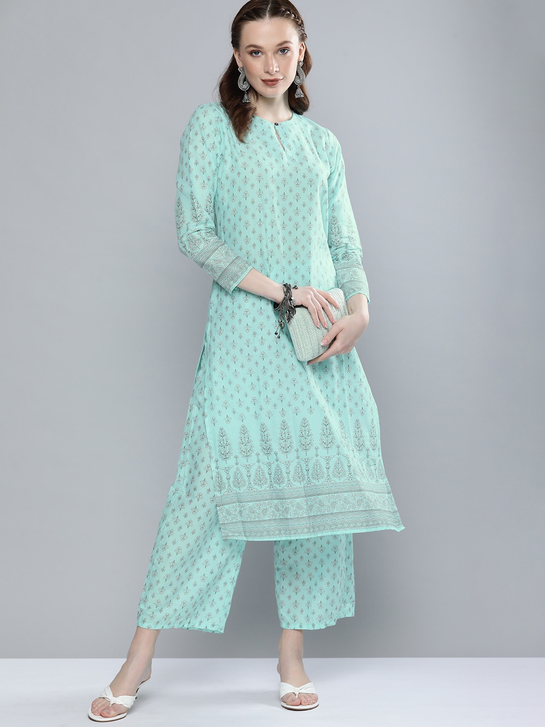 Vishudh Women Blue Ethnic Motifs Printed Panelled Pure Cotton Kurta with Trousers
Vishudh Women Blue Ethnic Motifs Printed Panelled Pure Cotton Kurta with Trousers