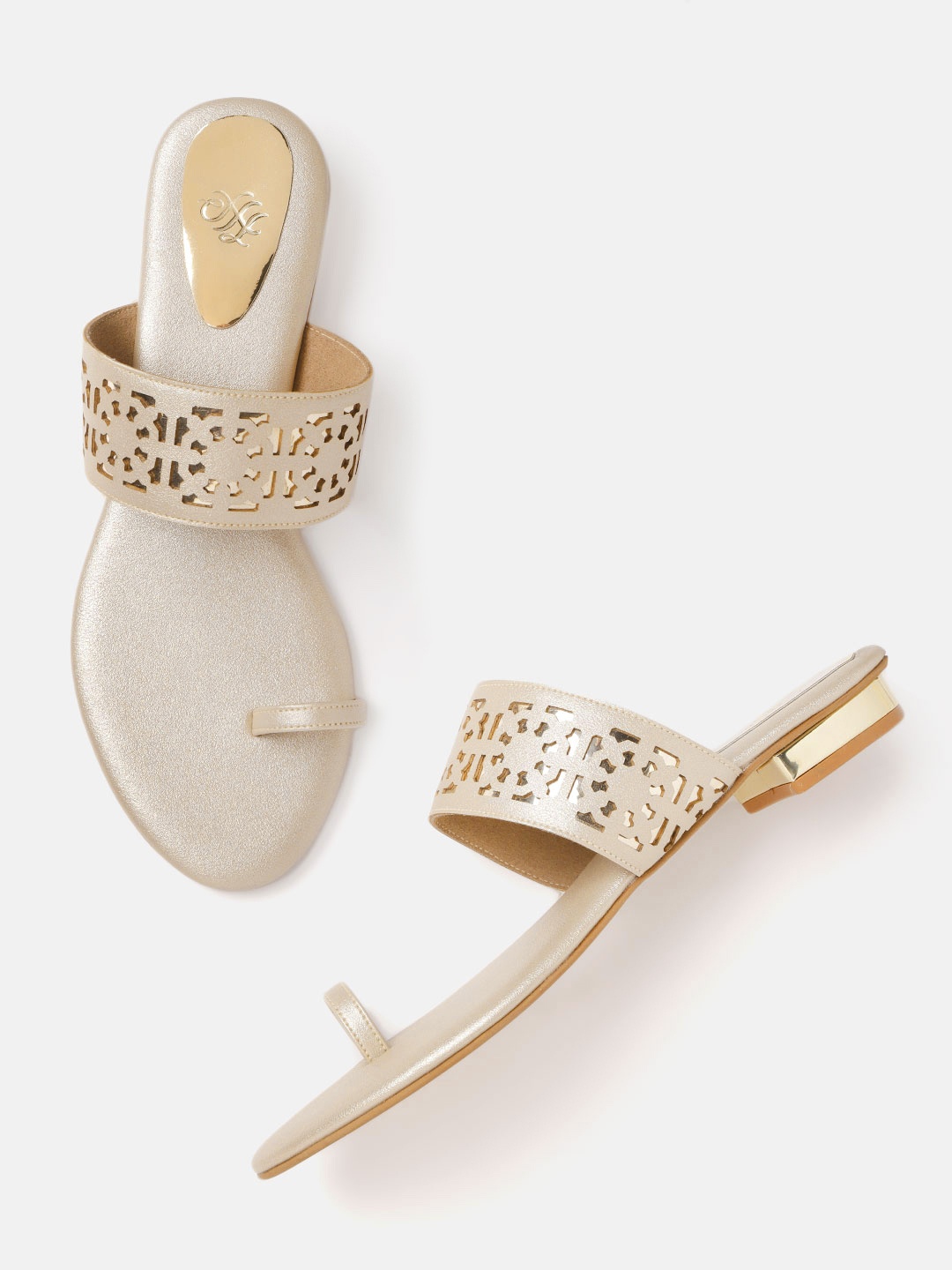 House of Pataudi Women Gold-Toned Ethnic Pattern laser Cut Handcrafted One Toe Flats
House of Pataudi Women Gold-Toned Ethnic Pattern laser Cut Handcrafted One Toe Flats