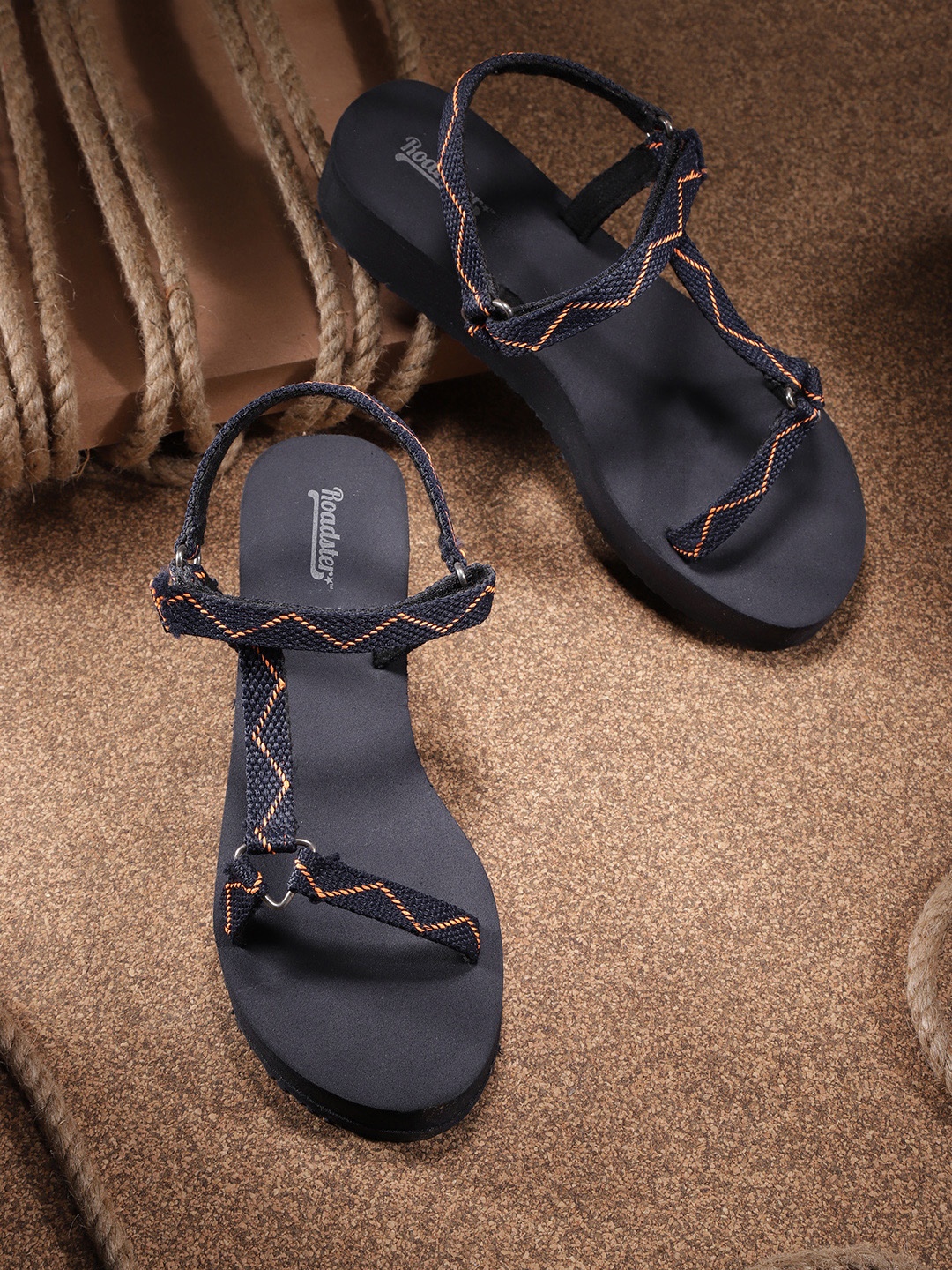 The Roadster Lifestyle Co Women Navy Blue & Orange Chevron Woven Design Sports Sandals
The Roadster Lifestyle Co Women Navy Blue & Orange Chevron Woven Design Sports Sandals