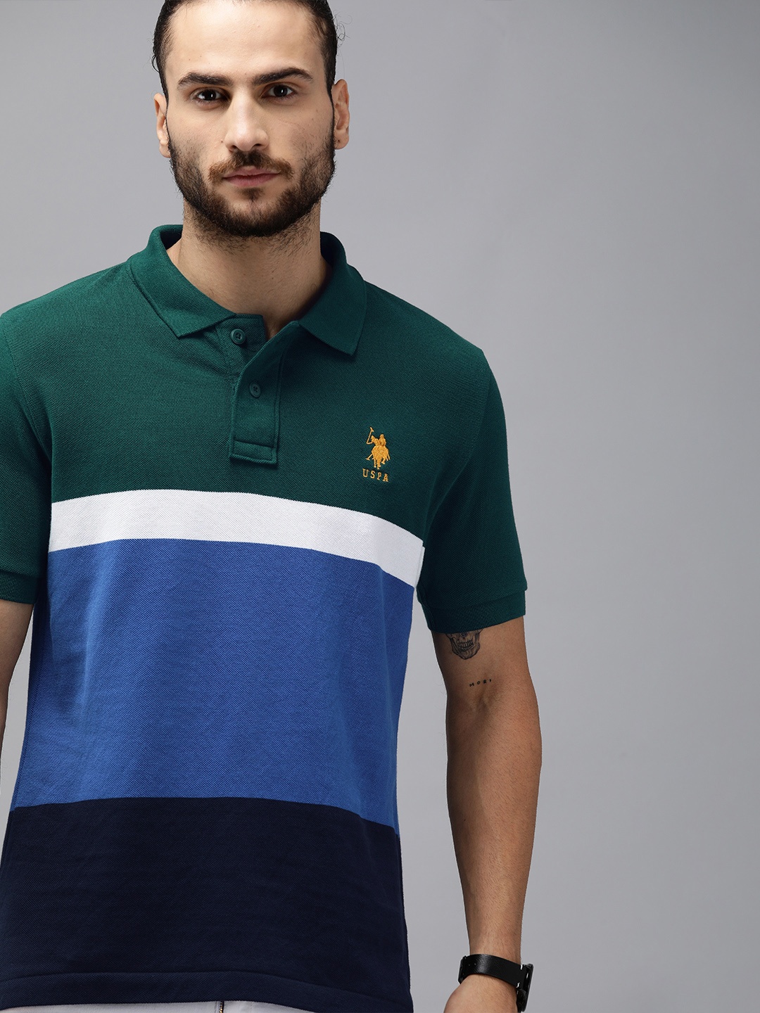 U.S. Polo Assn. Men Green Blue Slim Fit Colourblocked Polo Collar Pure Cotton T-shirt
U.S. Polo Assn. Men Green Blue Slim Fit Colourblocked Polo Collar Pure Cotton T-shirt
