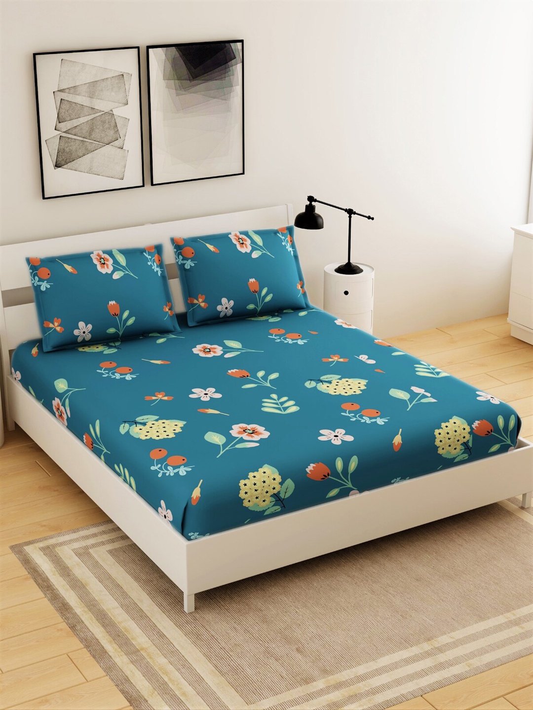 Salona Bichona Blue & Green Floral 144 TC Polyester 1 Queen Bedsheet with 2 Pillow Covers
Salona Bichona Blue & Green Floral 144 TC Polyester 1 Queen Bedsheet with 2 Pillow Covers