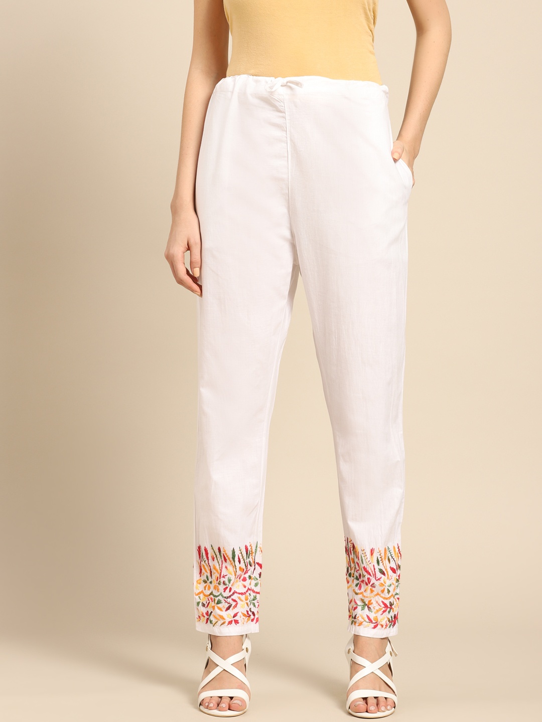 Saadgi Women White & Yellow Cotton Straight Fit Chikankari Embroidered Detail Peg Trousers
Saadgi Women White & Yellow Cotton Straight Fit Chikankari Embroidered Detail Peg Trousers