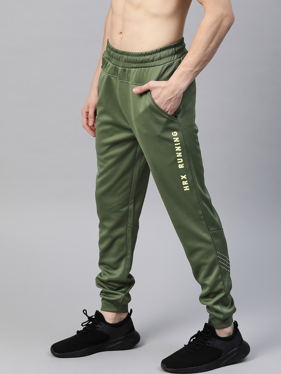 HRX By Hrithik Roshan Men Black Forest Typographic Slim Mid-Rise Rapid-Dry Running Joggers, Olive
HRX By Hrithik Roshan Men Black Forest Typographic Slim Mid-Rise Rapid-Dry Running Joggers, Olive