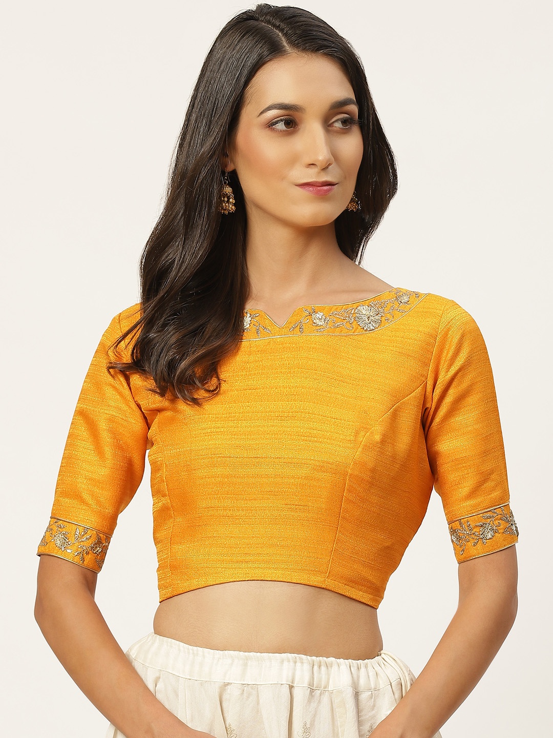 Studio Shringaar Women Mustard & Golden Solid Stitched Blouse with Embroidered Detail
Studio Shringaar Women Mustard & Golden Solid Stitched Blouse with Embroidered Detail