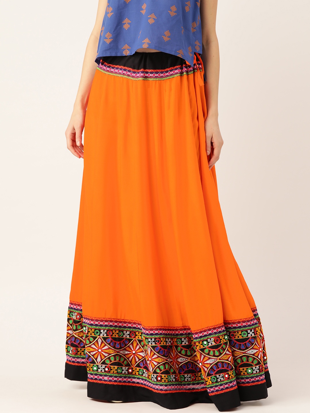 Vastraa Fusion Women Orange Pure Cotton Solid Maxi Flared Skirt with Embroidered Detail
Vastraa Fusion Women Orange Pure Cotton Solid Maxi Flared Skirt with Embroidered Detail