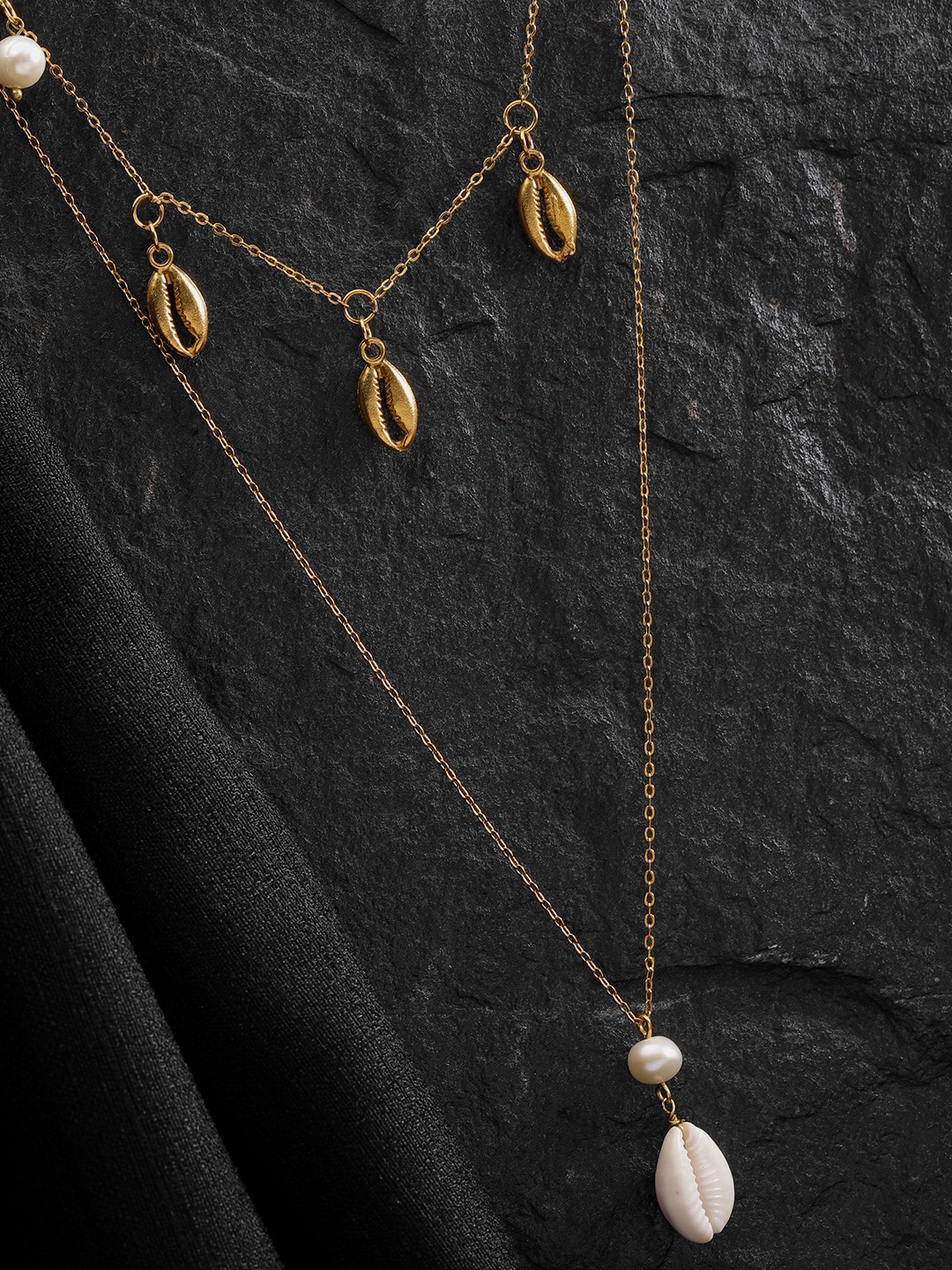 DIVA WALK EXCLUSIVE White Gold-Plated Beaded & Cowrie Detail Handcrafted Layered Necklace
DIVA WALK EXCLUSIVE White Gold-Plated Beaded & Cowrie Detail Handcrafted Layered Necklace