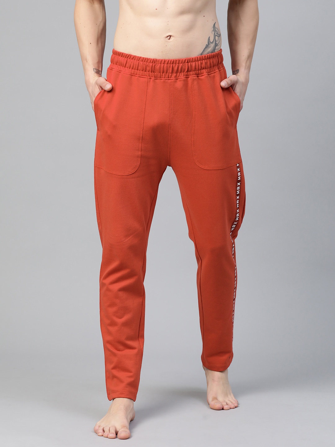 HRX By Hrithik Roshan Men Rust Red Solid Slim Fit Organic Cotton Bio-Wash Yoga Sustainable Track Pants
HRX By Hrithik Roshan Men Rust Red Solid Slim Fit Organic Cotton Bio-Wash Yoga Sustainable Track Pants