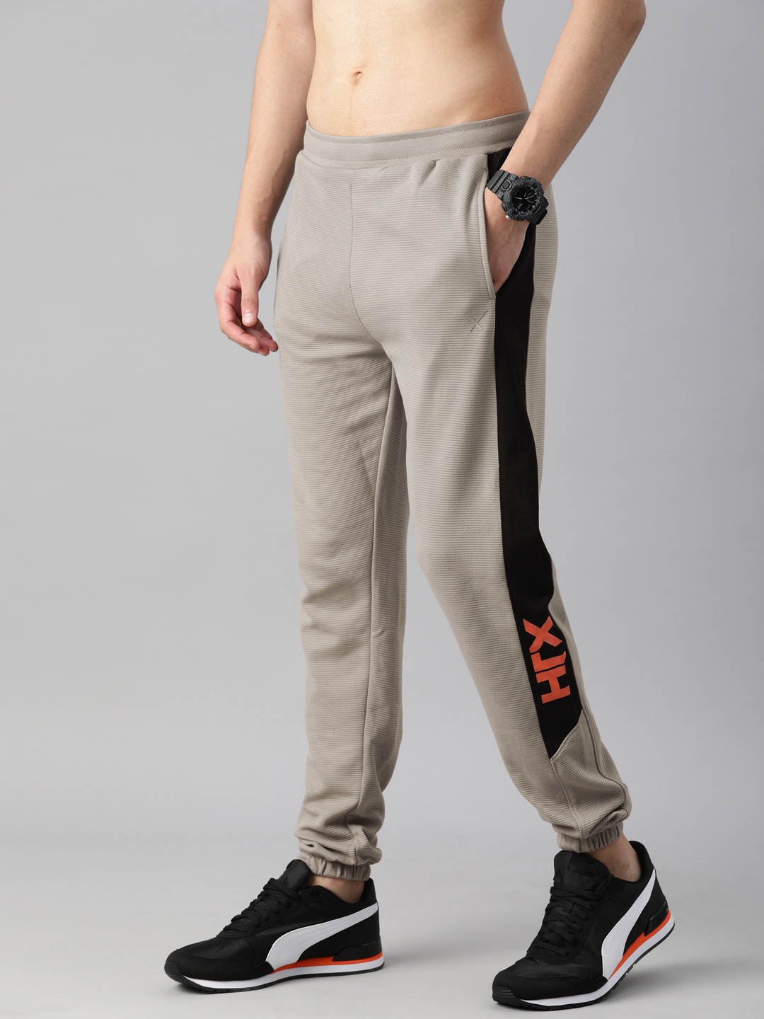 HRX By Hrithik Roshan Men Grey Solid Side Stripe Slim Fit Bio-Wash Lifestyle Joggers
HRX By Hrithik Roshan Men Grey Solid Side Stripe Slim Fit Bio-Wash Lifestyle Joggers