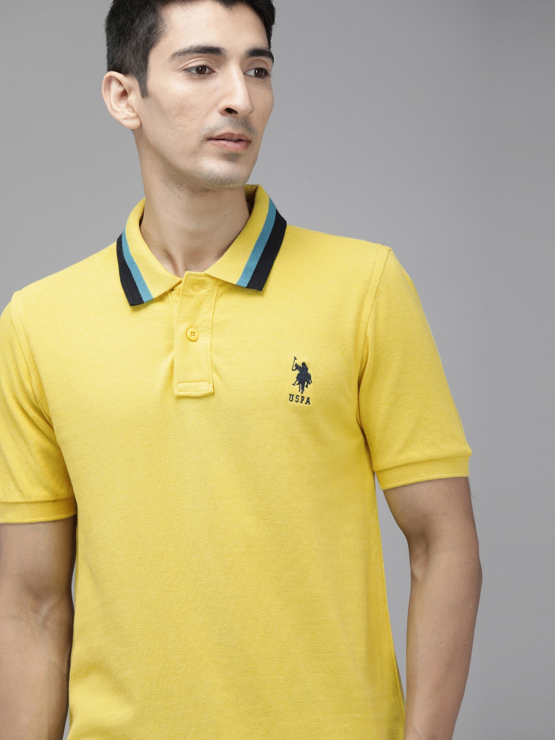 U.S. Polo Assn. Men Yellow Solid Polo Collar Cotton T-shirt with Brand Logo Applique
U.S. Polo Assn. Men Yellow Solid Polo Collar Cotton T-shirt with Brand Logo Applique