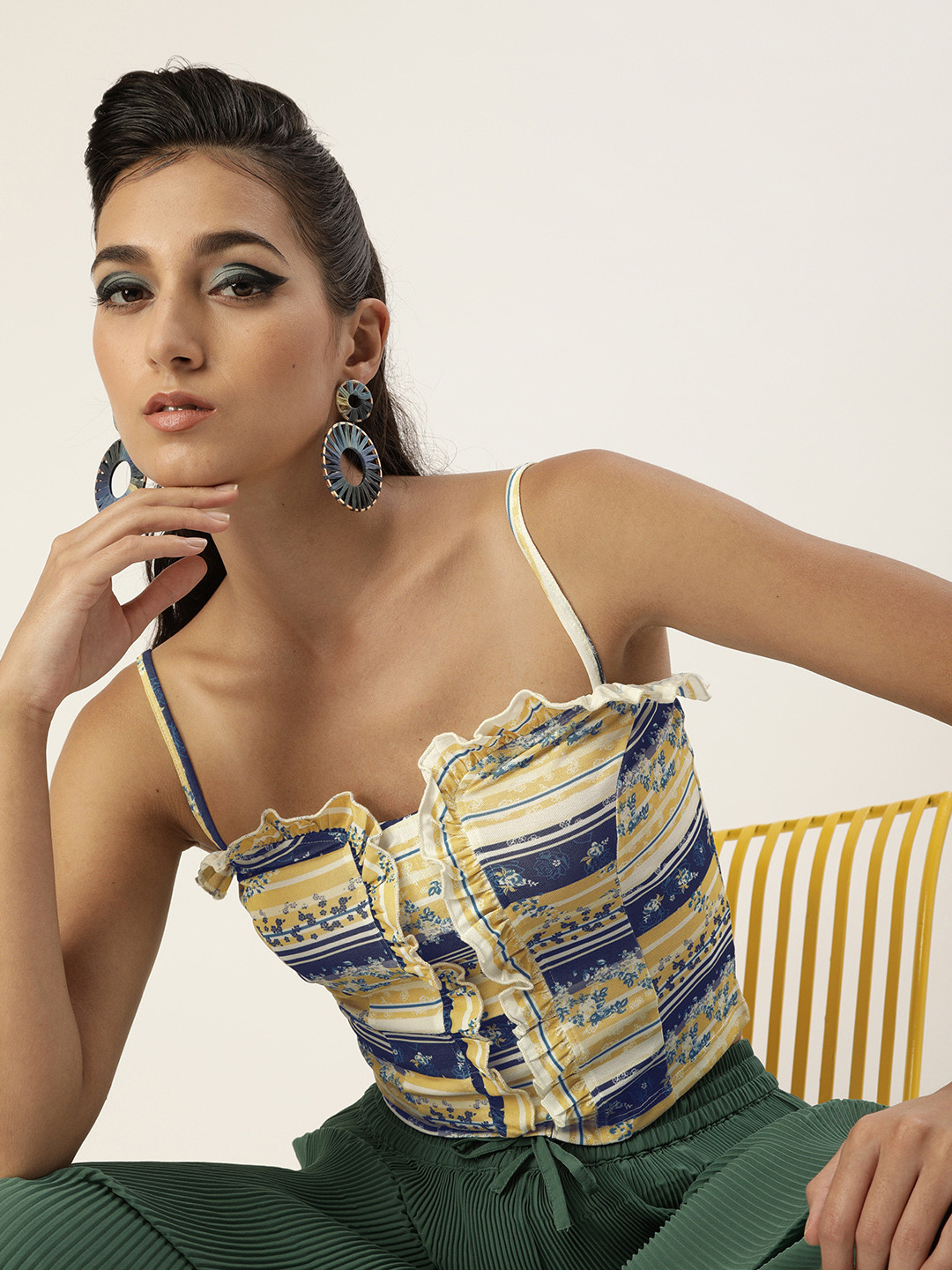 Veni Vidi Vici Classy Mustard and Navy Blue Ruffled Floral Printed Crop Top
Veni Vidi Vici Classy Mustard and Navy Blue Ruffled Floral Printed Crop Top