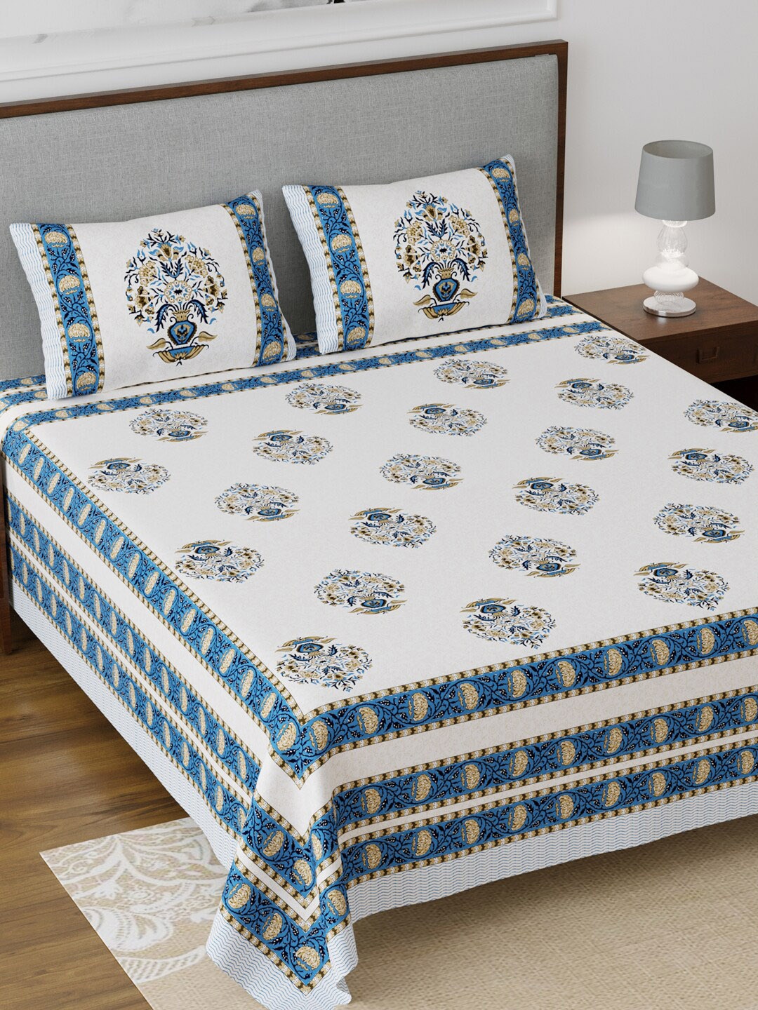 Salona Bichona White & Blue Ethnic Motifs 120 TC Cotton 1 King Bedsheet with 2 Pillow Covers
Salona Bichona White & Blue Ethnic Motifs 120 TC Cotton 1 King Bedsheet with 2 Pillow Covers