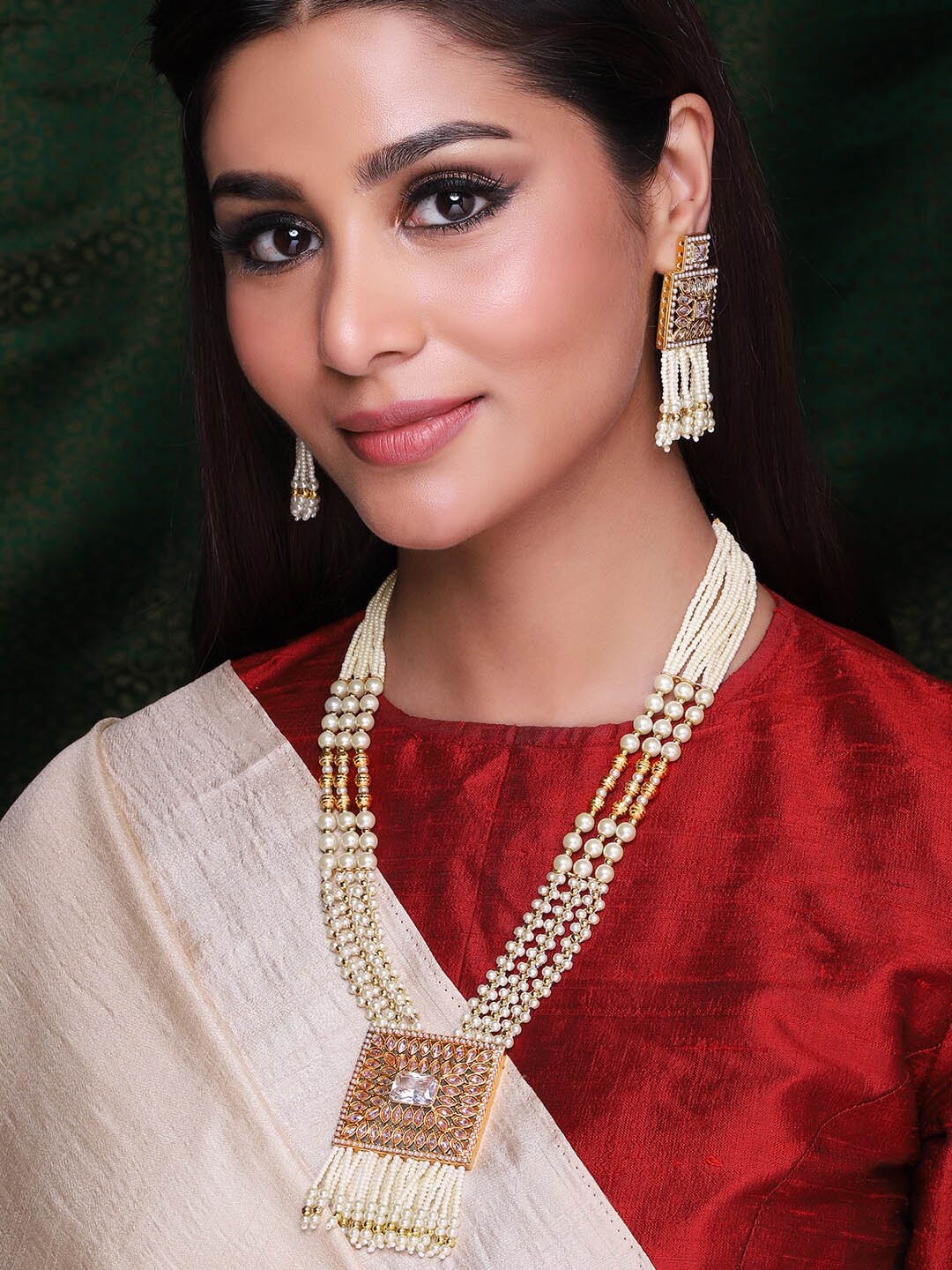 Rubans Gold-Toned & Off-White Stone-Studded Pearl-Beaded Handcrafted Jewellery Set
Rubans Gold-Toned & Off-White Stone-Studded Pearl-Beaded Handcrafted Jewellery Set