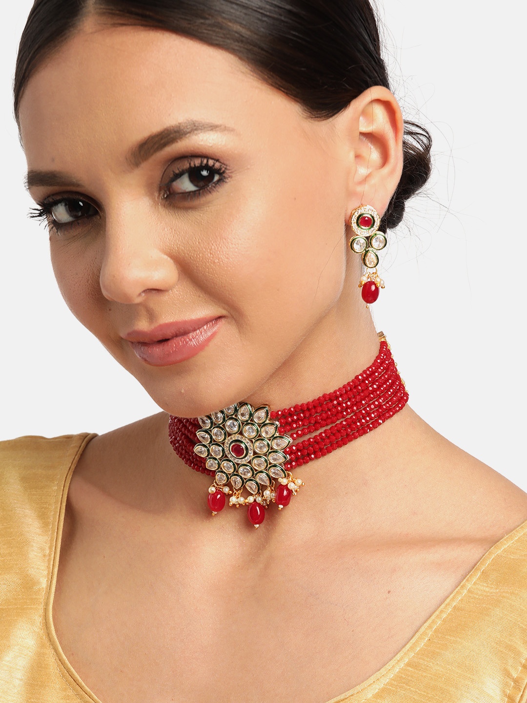 JEWELS GEHNA Maroon Gold-Plated Kundan Studded & Beaded Handcrafted Jewellery Set, Red
JEWELS GEHNA Maroon Gold-Plated Kundan Studded & Beaded Handcrafted Jewellery Set, Red