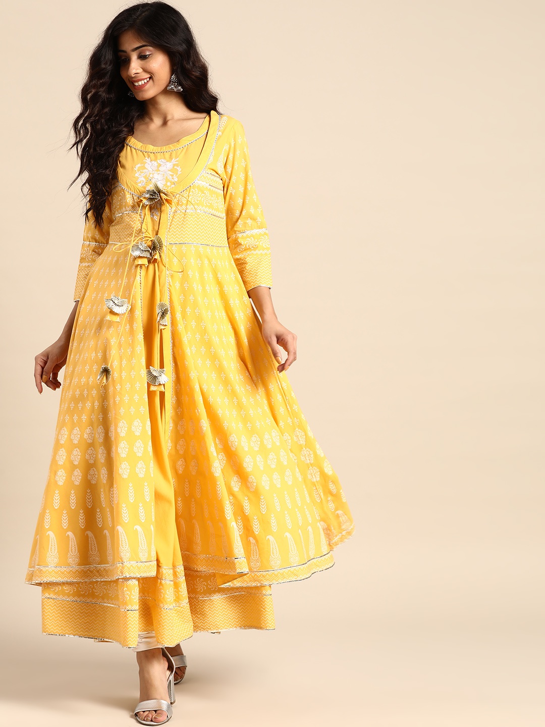 Rangmayee Women Yellow & White Embroidered A-Line Kurta with Longline Ethnic Jacket
Rangmayee Women Yellow & White Embroidered A-Line Kurta with Longline Ethnic Jacket