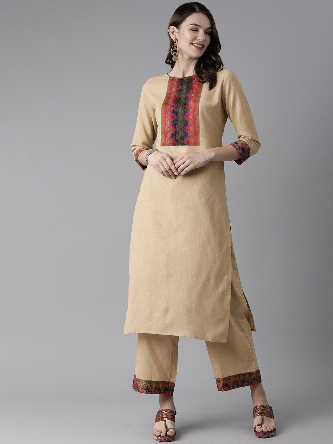 Indo Era Women Beige Yoke Design Pure Cotton Kurta with Palazzos
Indo Era Women Beige Yoke Design Pure Cotton Kurta with Palazzos