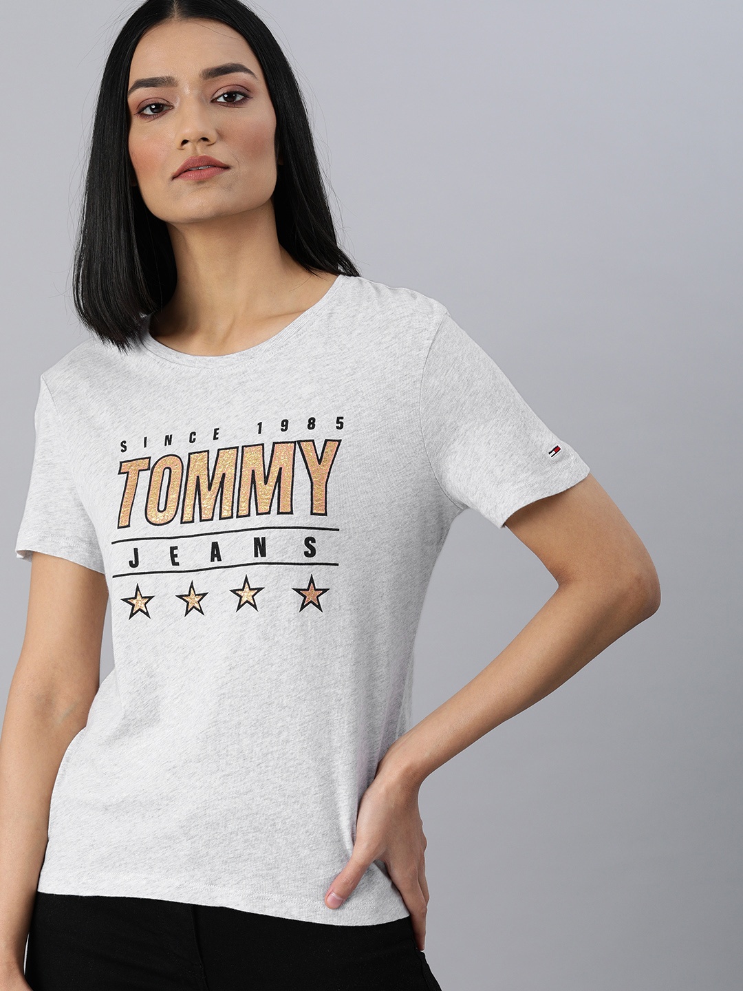 Tommy Hilfiger Women Grey Melange Gold-Coloured Slim Fit Printed Round Neck Pure Cotton T-shirt
Tommy Hilfiger Women Grey Melange Gold-Coloured Slim Fit Printed Round Neck Pure Cotton T-shirt