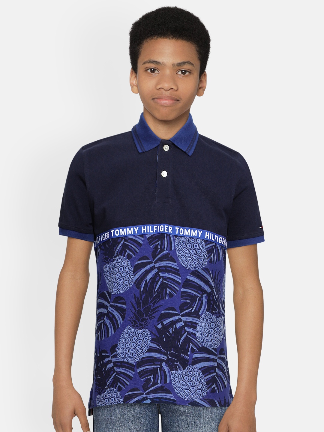 Tommy Hilfiger Boys Navy Blue Tropical Printed Pure Cotton Polo Collar Pure Cotton T-shirt
Tommy Hilfiger Boys Navy Blue Tropical Printed Pure Cotton Polo Collar Pure Cotton T-shirt
