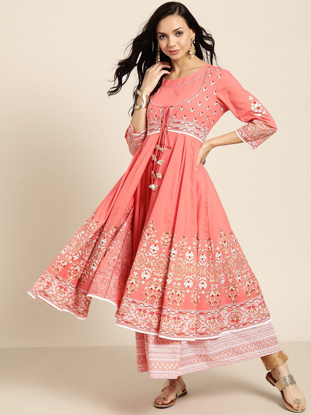 Sangria Women Coral Pink & White Printed Gotta Patti Anarkali Kurta with Ethnic Layer
Sangria Women Coral Pink & White Printed Gotta Patti Anarkali Kurta with Ethnic Layer