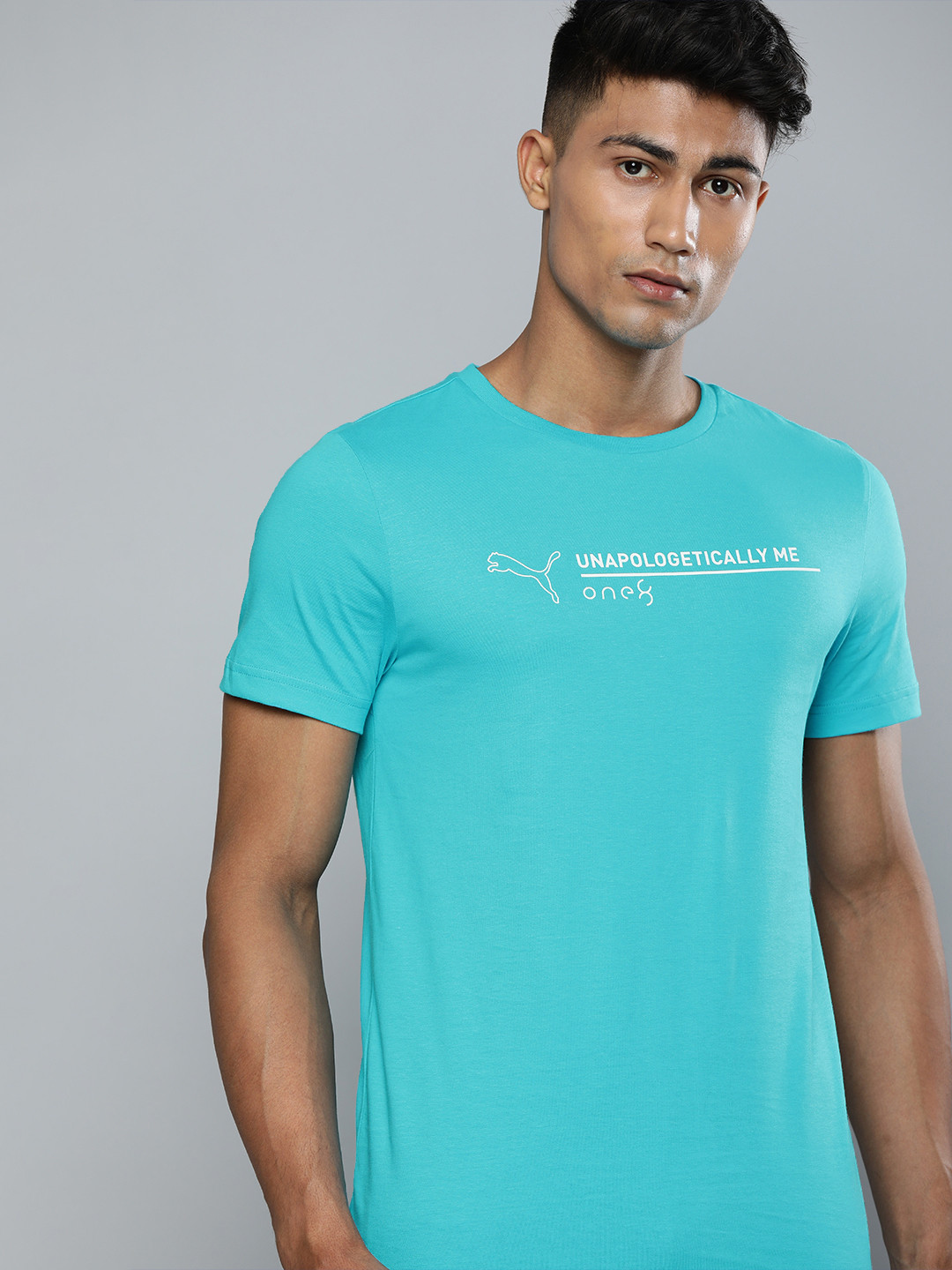 one8 x PUMA Men Turquoise Blue Solid Slim Fit Round Neck Pure Cotton T-shirt With Printed Detailing
one8 x PUMA Men Turquoise Blue Solid Slim Fit Round Neck Pure Cotton T-shirt With Printed Detailing