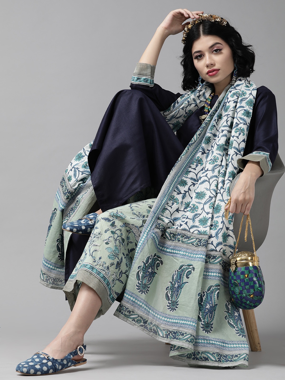 Indo Era Navy Blue and Sea Green Kurta with Romantic Floral Print Palazzos and Dupatta
Indo Era Navy Blue and Sea Green Kurta with Romantic Floral Print Palazzos and Dupatta