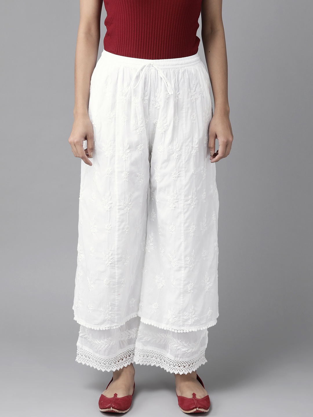 ADA Women White Chikankari Hand-Embroidered Layered Cotton Wide Leg Palazzos
ADA Women White Chikankari Hand-Embroidered Layered Cotton Wide Leg Palazzos