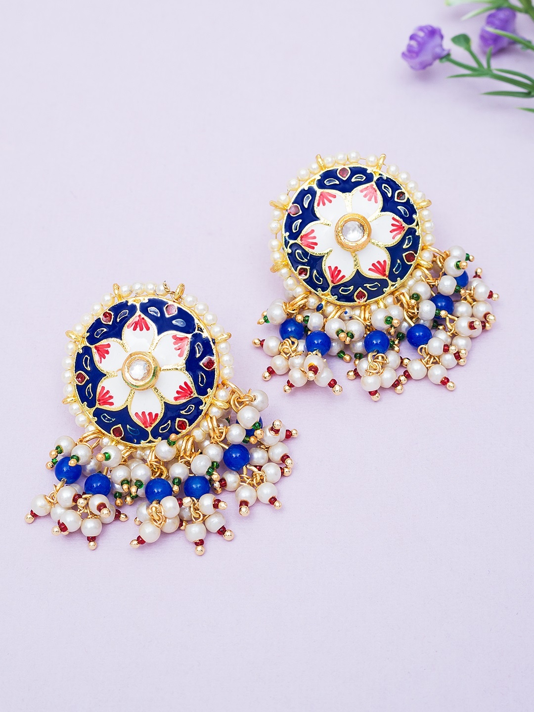 Golden Peacock Blue & Gold-Toned Stone-Studded & Beaded Enamelled Circular Drop Earrings
Golden Peacock Blue & Gold-Toned Stone-Studded & Beaded Enamelled Circular Drop Earrings