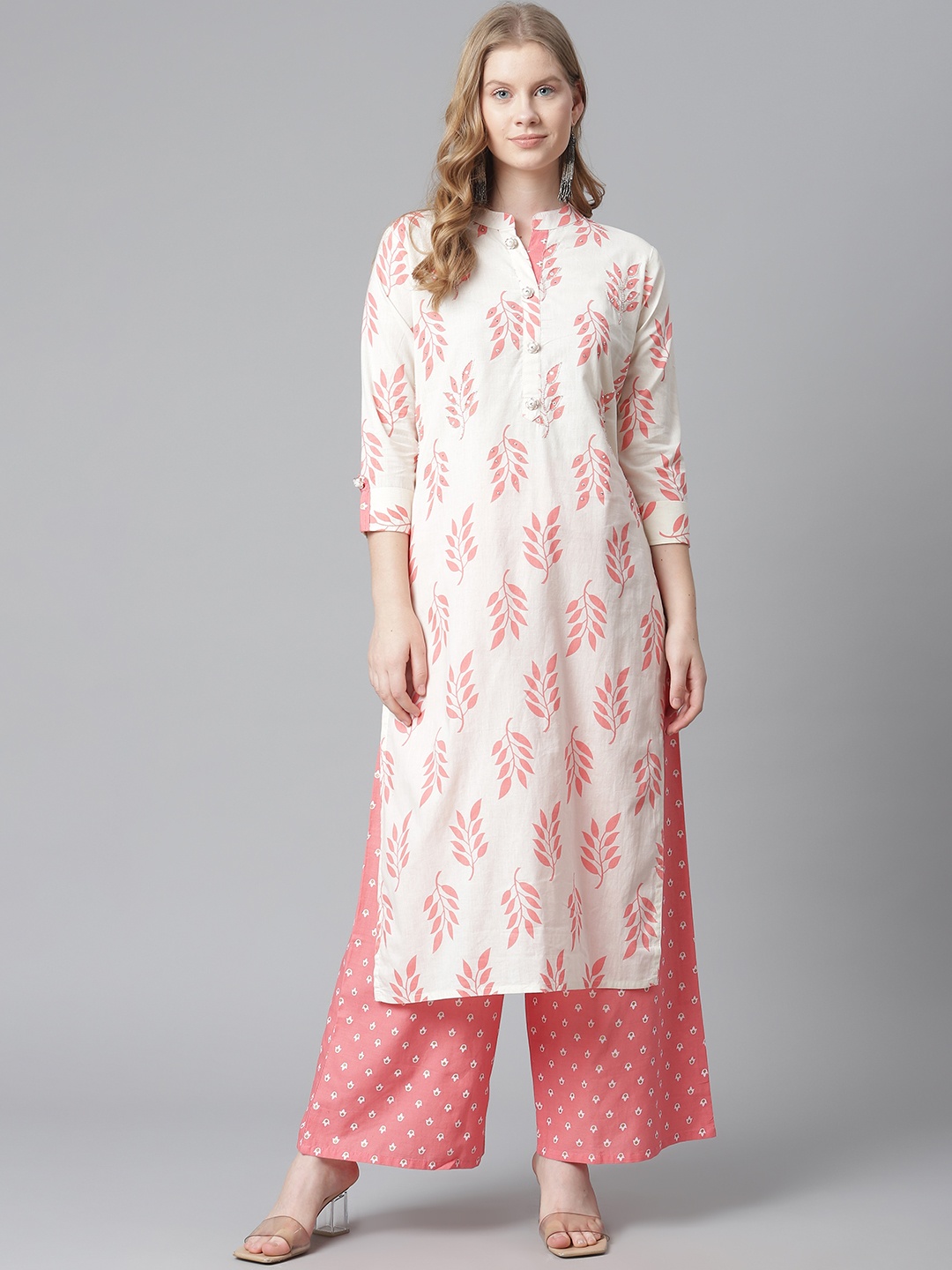 HIGHLIGHT FASHION EXPORT Women White & Peach Coloured Cotton Printed Kurta with Palazzos
HIGHLIGHT FASHION EXPORT Women White & Peach Coloured Cotton Printed Kurta with Palazzos