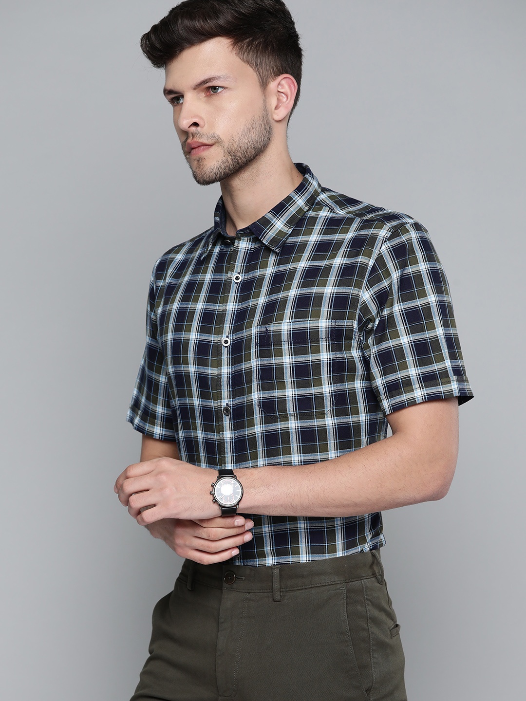 Indian Terrain Men Olive Green & Navy Cotton Slim Fit Tartan Checks Smart Casual Shirt
Indian Terrain Men Olive Green & Navy Cotton Slim Fit Tartan Checks Smart Casual Shirt